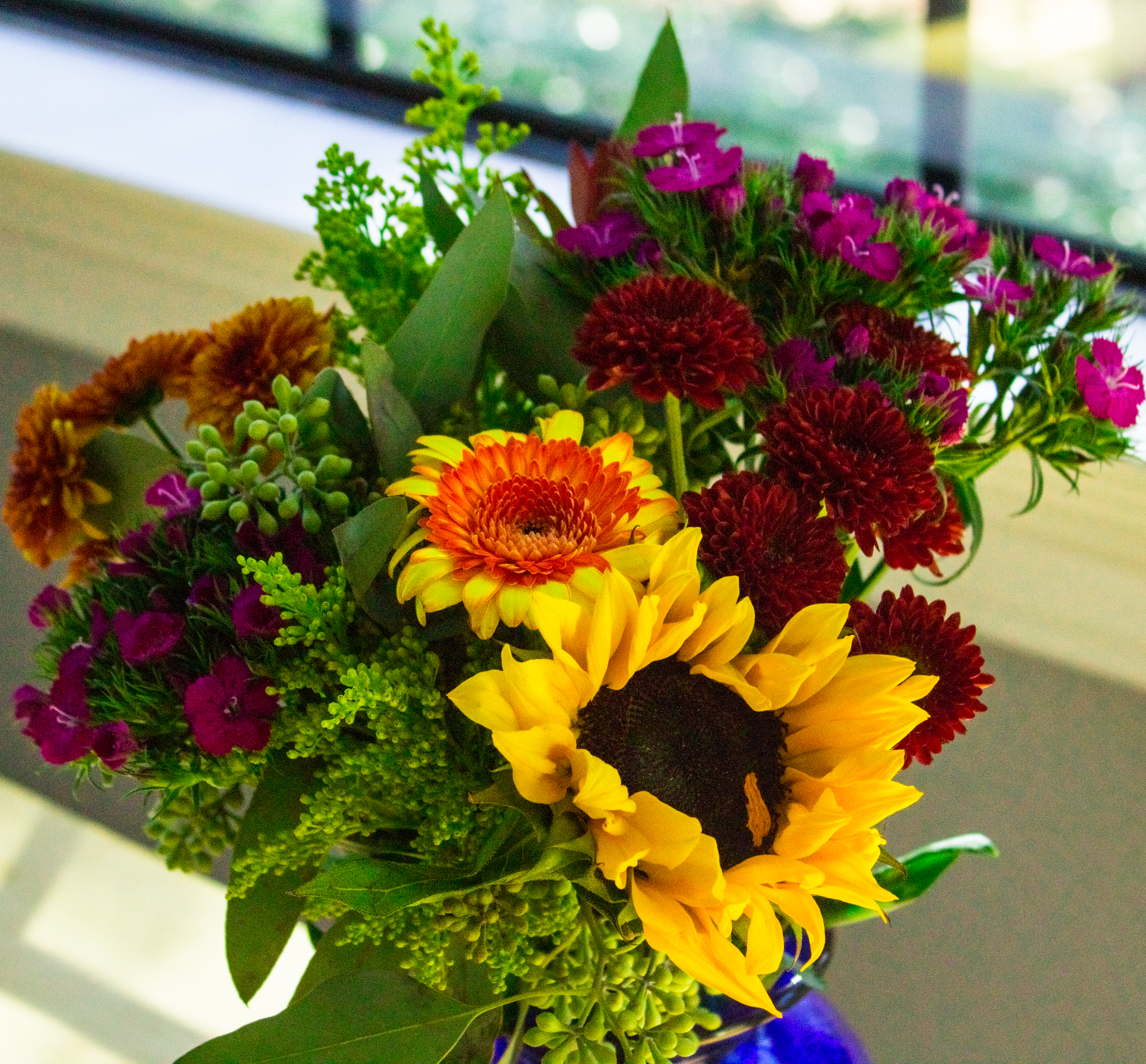 Rounded Flowers in blue vase-1482