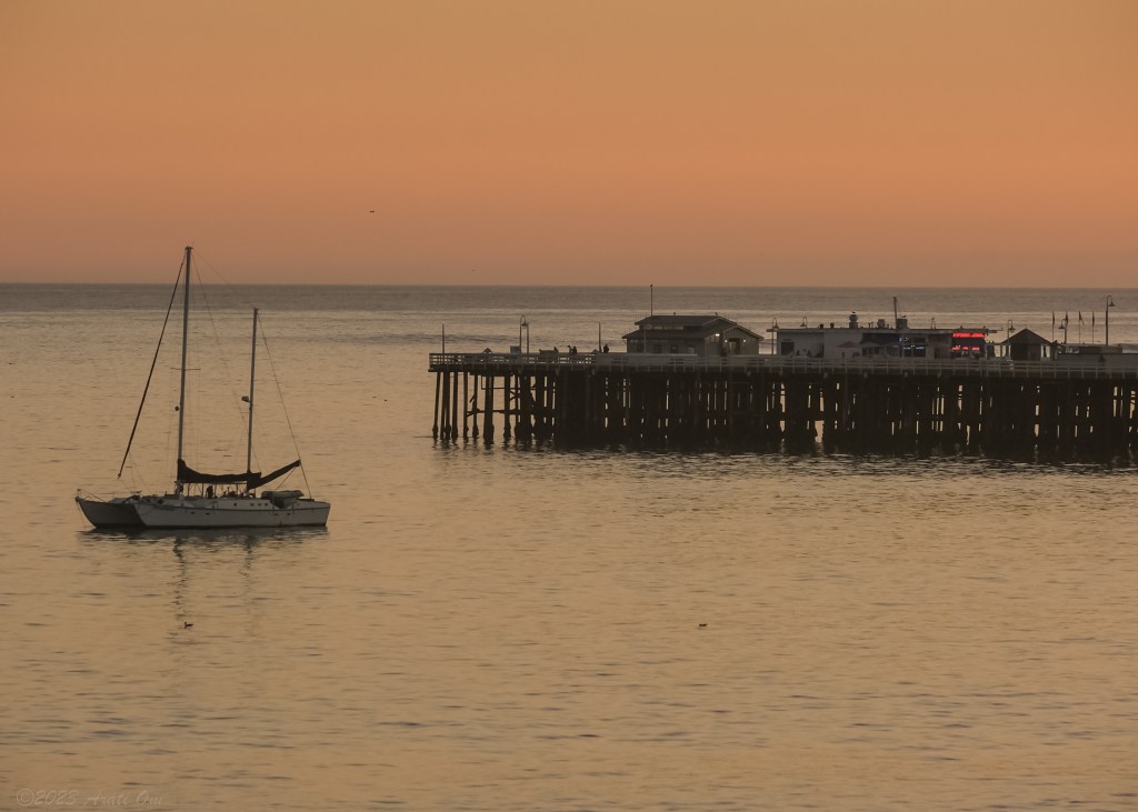 A sailboat, a wharf and a couple of photographers… Santa Cruz at&nbsp;sunset