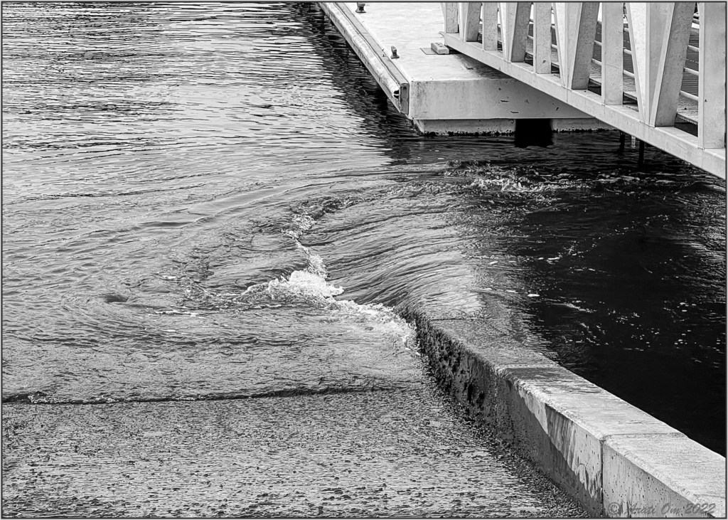 Monochrome Mondays: Water flowing under a&nbsp;walkway